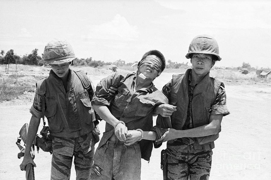 Marine Escorts N. Vietnamese Soldier Photograph by Bettmann