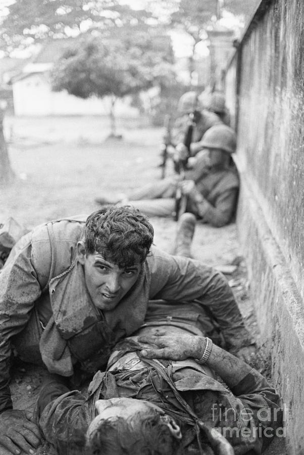 Marine Helping Wounded Friend, 1968 Photograph by Bettmann