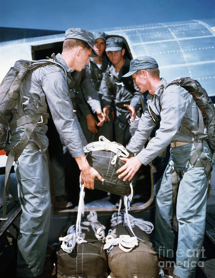 Marine Soldiers Putting Bags On Airplane Photograph by Bettmann