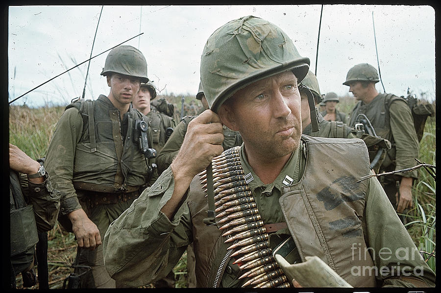 Marine With Unit After Battle Photograph by Bettmann