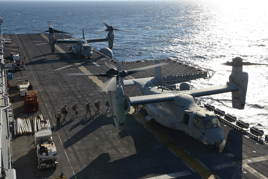 Marines Load Onto A Mv-22 Osprey Aboard Photograph by Stocktrek Images ...