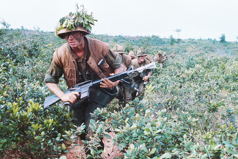 Marines Running Through Field by Bettmann