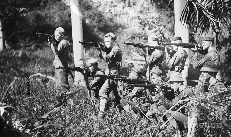 Marines With Guns On Hatian Shore Photograph by Bettmann