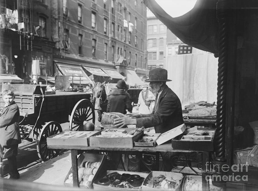 Market Scene With Pedestrians And Wagon by Bettmann