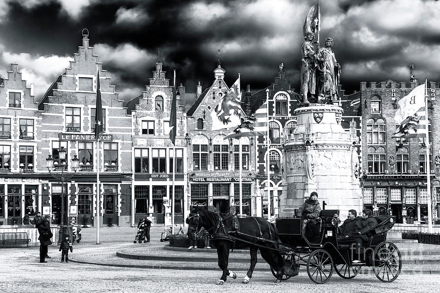Market Square Drama in Bruges Photograph by John Rizzuto