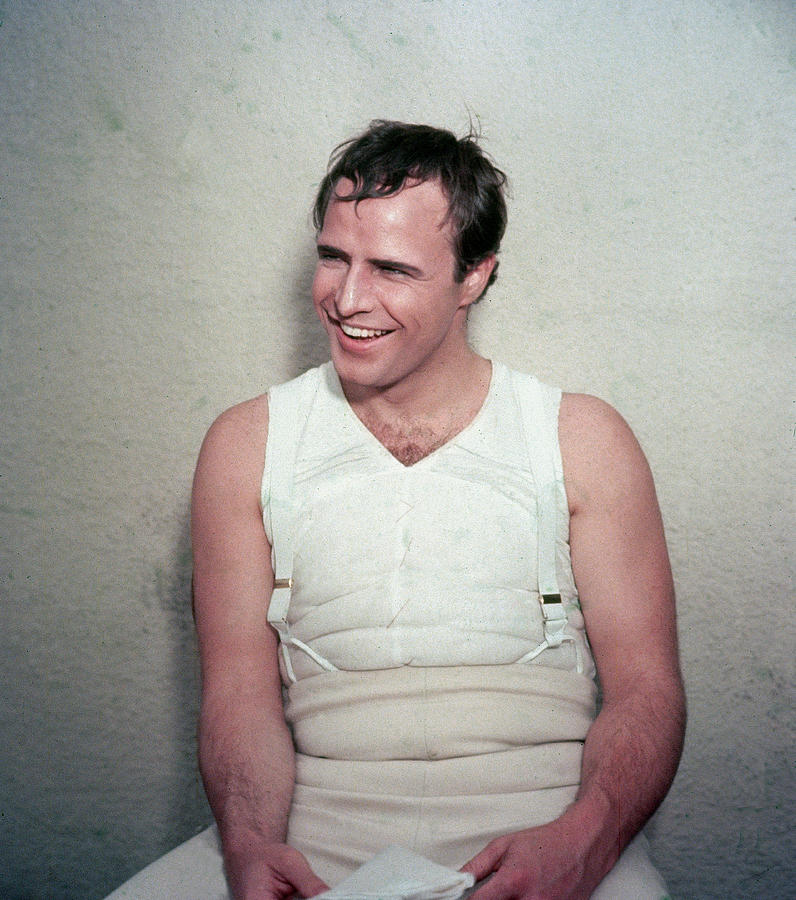 Marlon Brando Laughing On Film Set Photograph by Hulton Archive