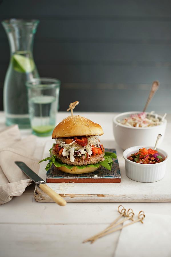 Maroccan Lamb Burger With Mint Yoghurt, Coleslaw And Tomato Spicy Relish Photograph by Magdalena Hendey