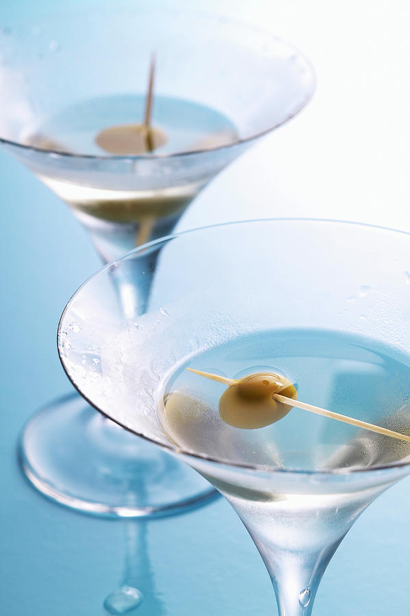 Martini Dry - A Cocktail With Gin, Dry Vermouth And A Green Olive Photograph by Teubner Foodfoto