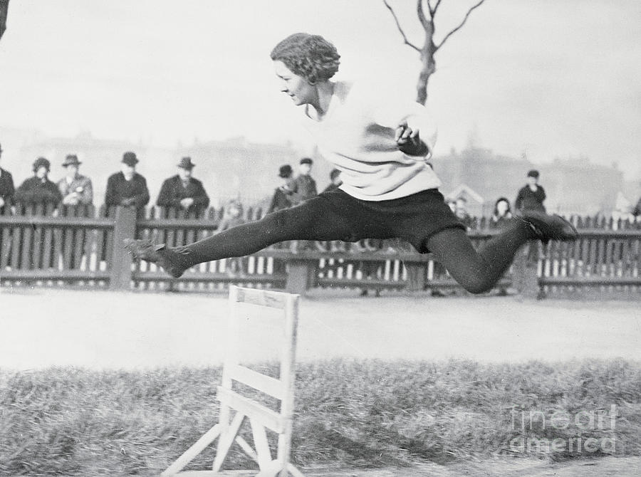 Mary Lines During Olympic Hurdle Jump Photograph by Bettmann