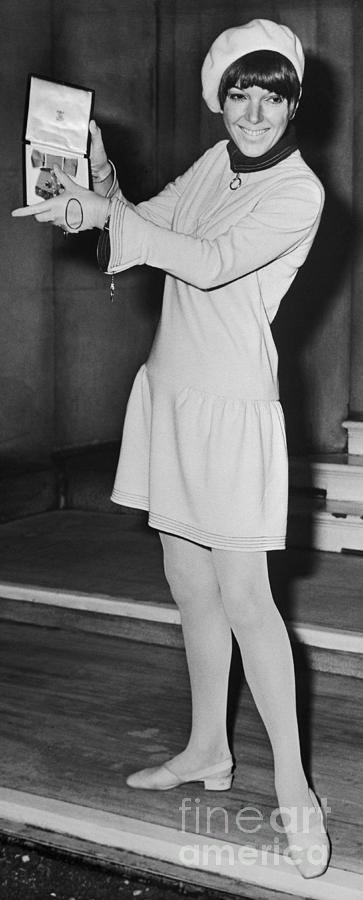 Mary Quant In Miniskirt And Holding by Bettmann