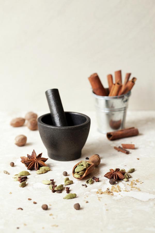 Masala Chai Spices With A Pestle And Mortar Photograph by Jane Saunders