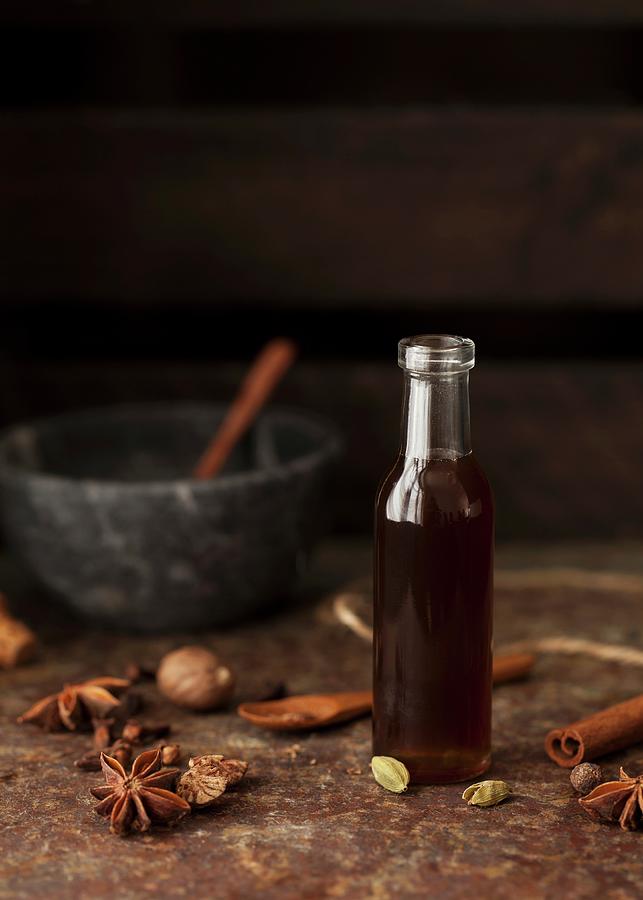 Masala Chai Syrup With Star Anise, Cardamom And Cinnamon Photograph by Jane Saunders
