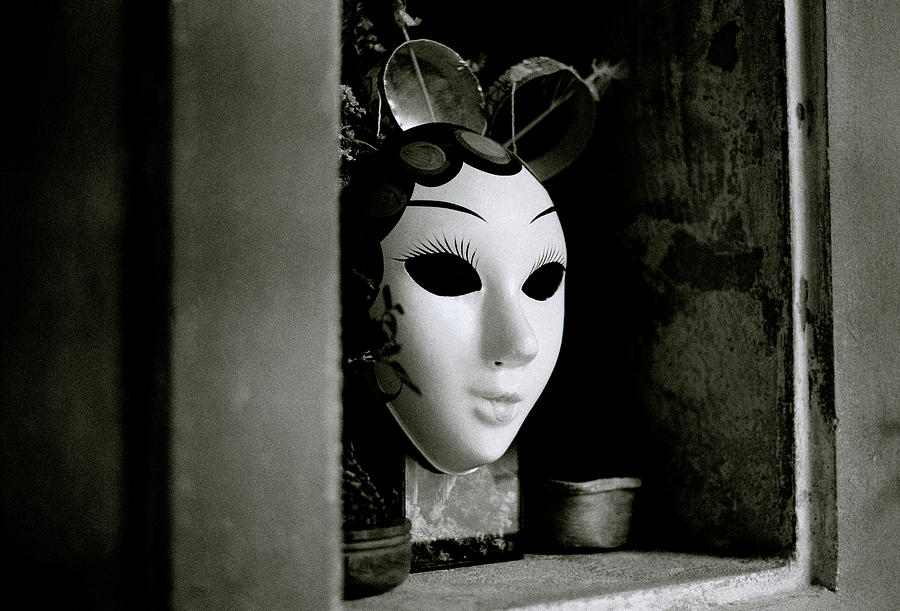 Mask In The Window In Thailand Photograph by Shaun Higson