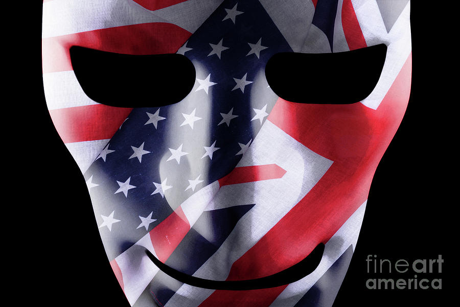 Mask with GB and USA flags overlaid Photograph by Simon Bratt