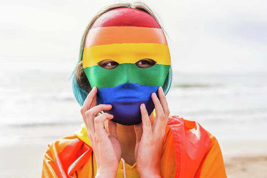 Flag Photograph - Masked Person With Authentic Hand Painted Lgbt Mask On The Beach by Cavan Images