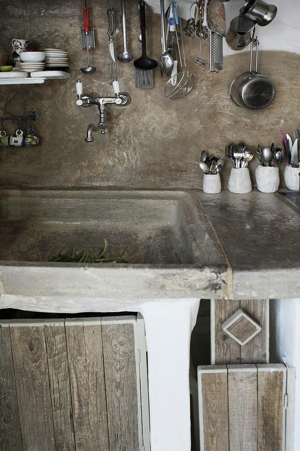 Masonry Kitchen Counter With Rustic Wooden Doors Photograph by Annette Nordstrom