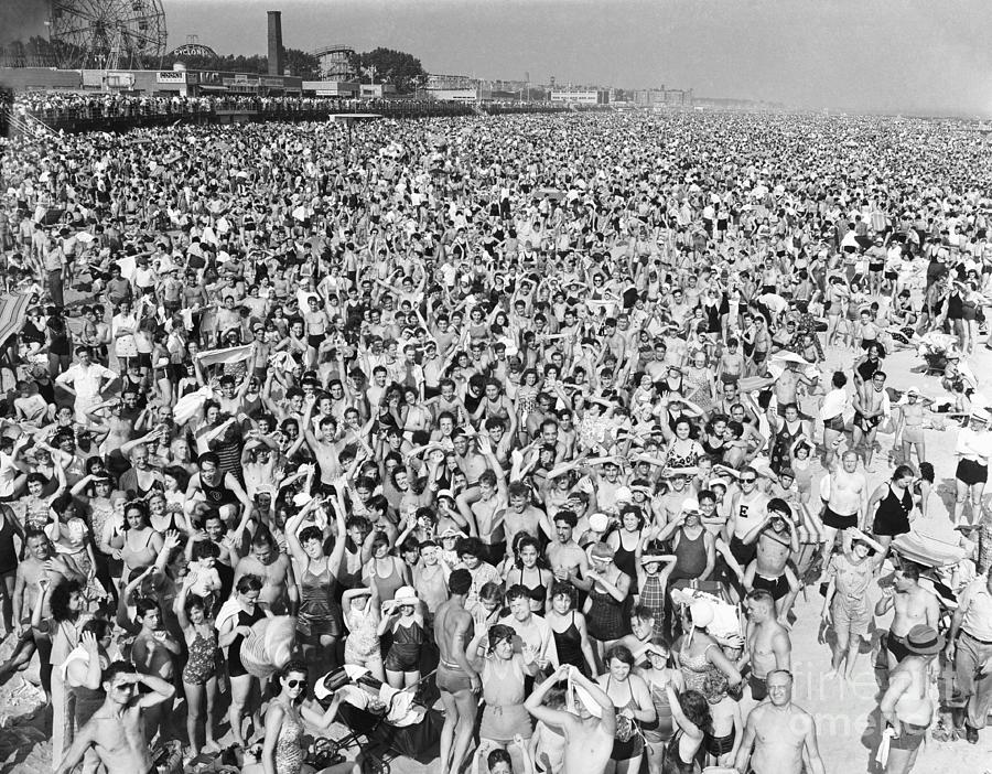 Massive Crowd On Beach At Coney Island by Bettmann