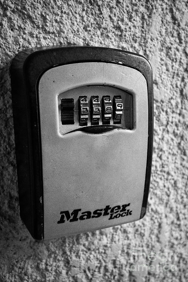 Key Photograph - master lock key lockbox at an airbnb property in the USA United States of America by Joe Fox