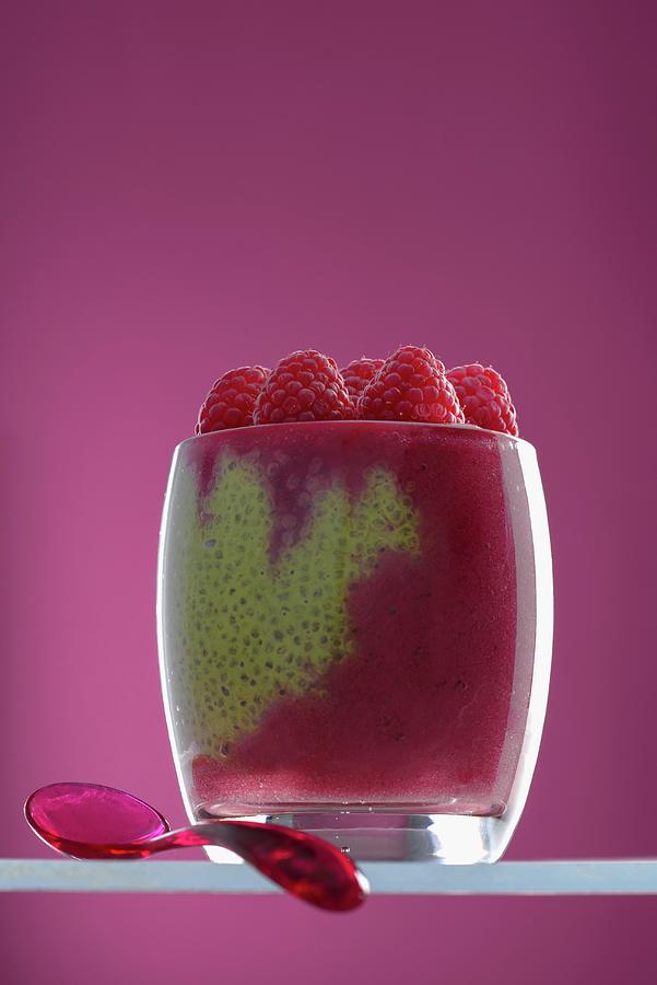 Matcha Chia Pudding With Raspberry Puree In A Glass Photograph by Laurange
