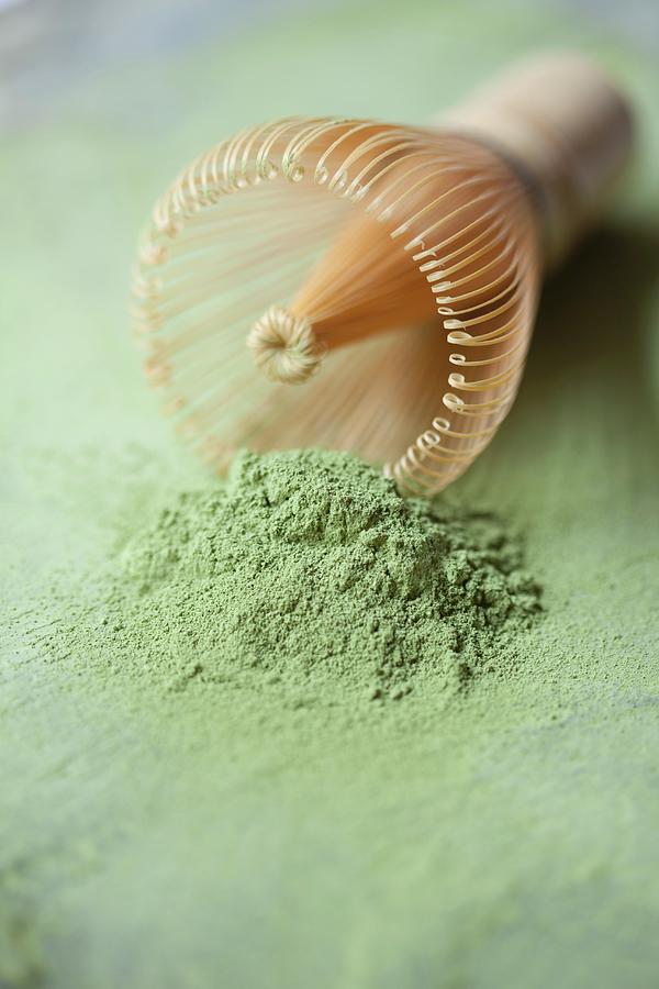 Matcha Tea And A Matcha Whisk Photograph by Hilde Mche