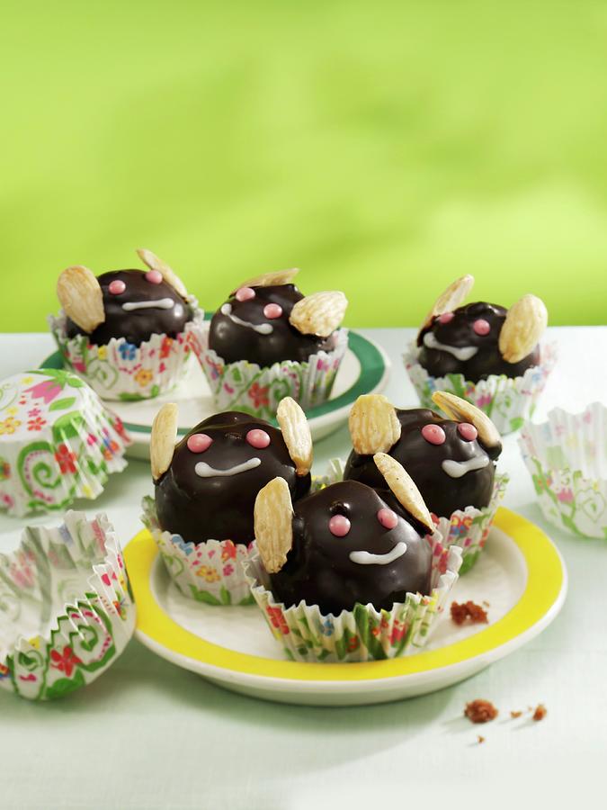 May Bug Muffins With Chocolate Icing And Almonds Photograph by Newedel, Karl