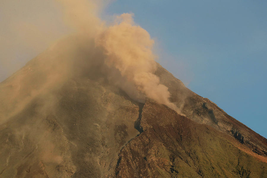 Mayon Volcano Emits Lava and Ash Photograph by Erik de Castro - Fine ...