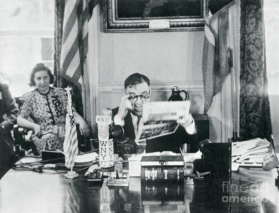 Mayor Fiorello Laguardia Reading Photograph by Bettmann