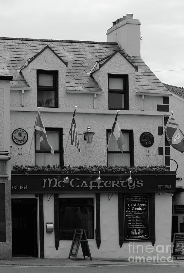 McCaffertys Pub Donegal bw Photograph by Eddie Barron