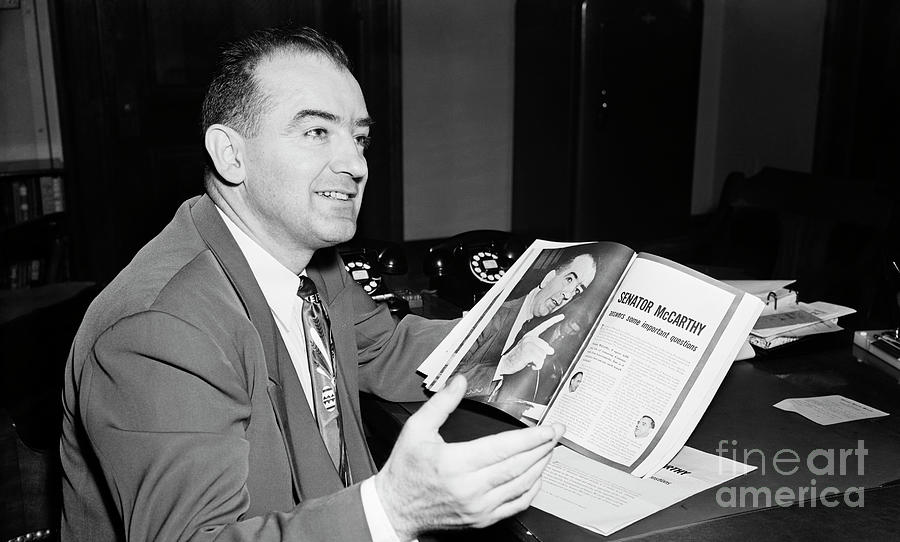 Mccarthy Looking Over Article Photograph by Bettmann