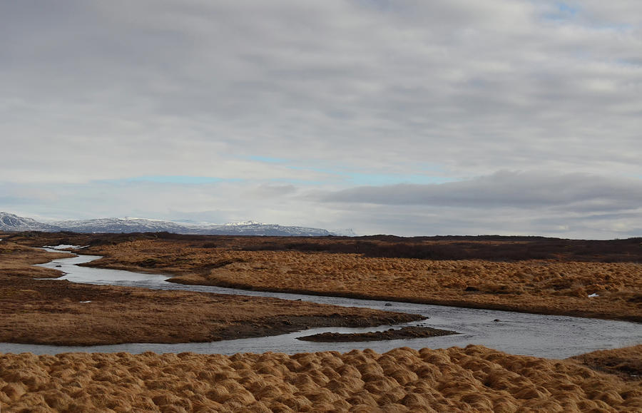 Meandering Stream and Grassland Below Cloudscape Iceland Photograph by Shawn OBrien