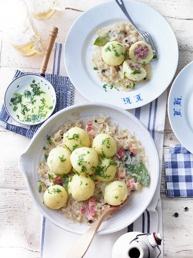 Meat Dumplings With Cabbage And Bacon Photograph by Nikolai Buroh