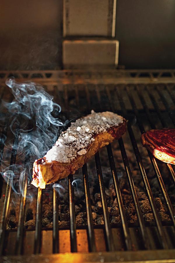 Meat On The Grill At The lomo Alto Restaurant In Barcelona, Spain Photograph by Jalag / Markus Bassler
