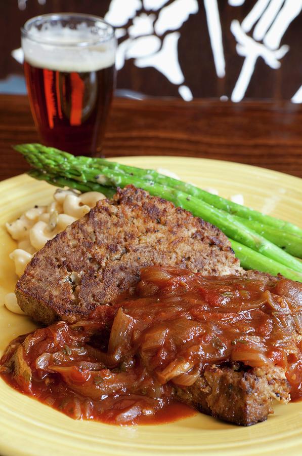 Meatloaf With Macaroni And Cheese Served With Asparagus And Beer Photograph by Amy Kalyn Sims