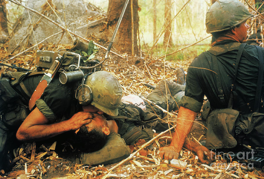 Medic Giving Cpr To Soldier Photograph by Bettmann