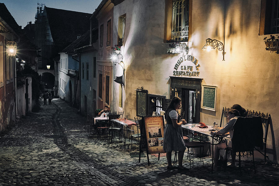 Night Photograph - Medieval Cafe by Marius Bodea Night Photograph - Medieval Cafe by Marius Bodea