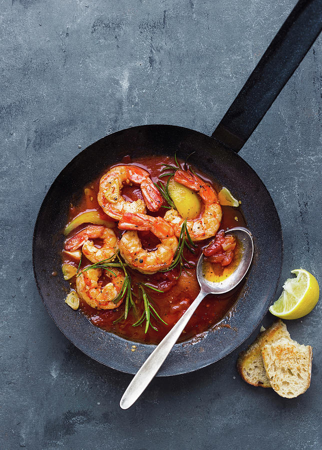 Mediterranean Fried Prawns With Peppers, Tomatoes And Rosemary Photograph by Ira Leoni