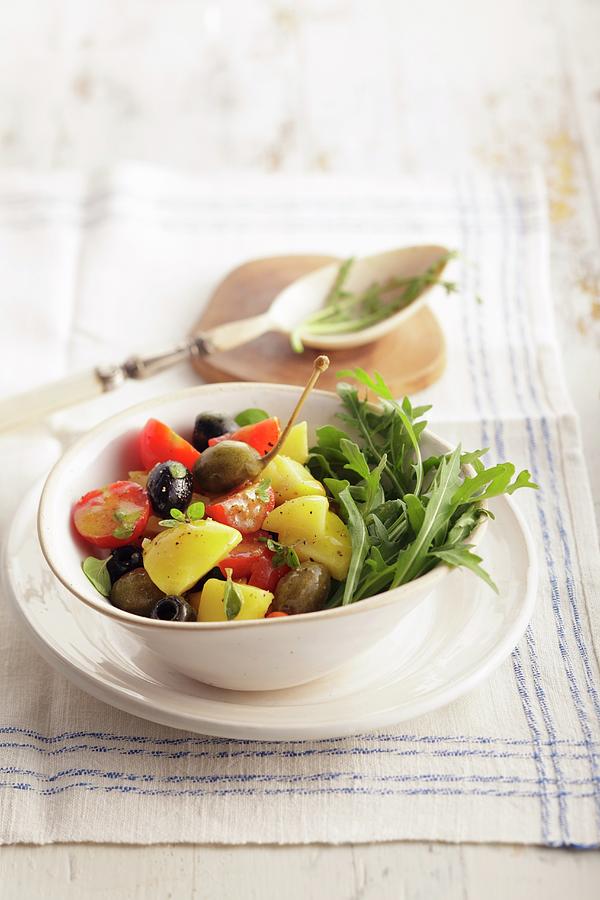 Mediterranean Potato Salad With Rocket, Tomatoes And Olives Photograph by Garten, Peter