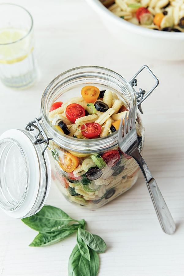 Mediterrean Pasta Sald In A Jar, Sardinian Gnocchetti, Cherry Tomato, Spring Onions And Basil Photograph by Ina Peters