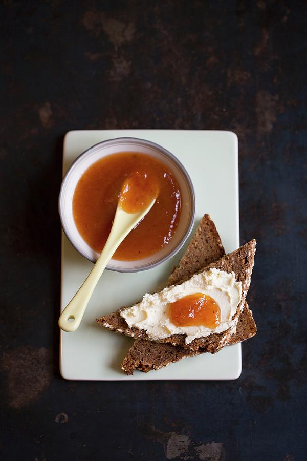 Medlar Jam On A Bowl And On A Slice Of Toast With Cream Cheese seen From Above Photograph by Tina Engel