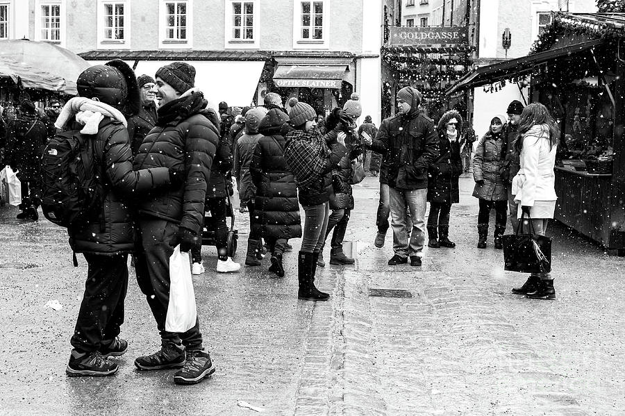 Meeting at the Salzburger Christkindlmarkt Photograph by John Rizzuto