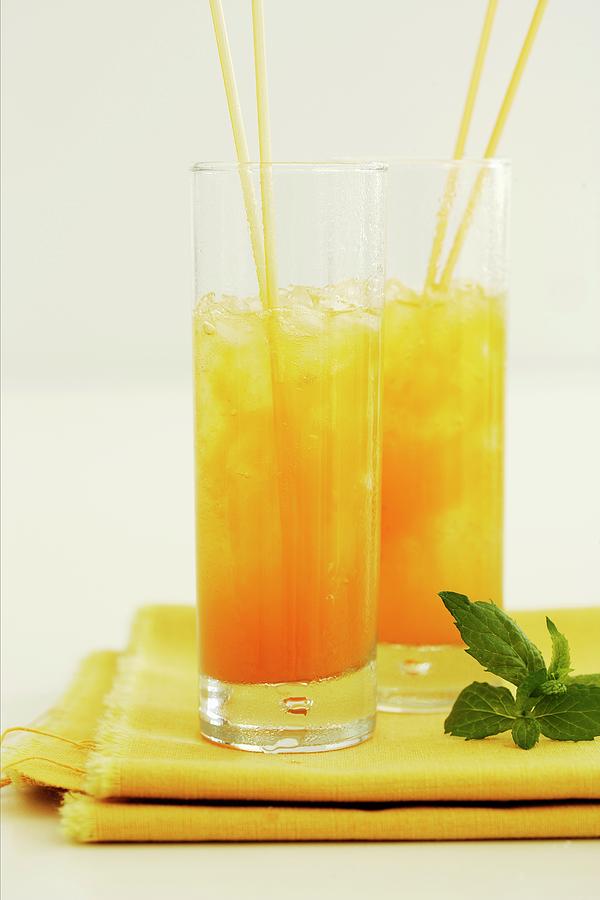 Melon And Ginger Coolers Photograph by Michael Wissing