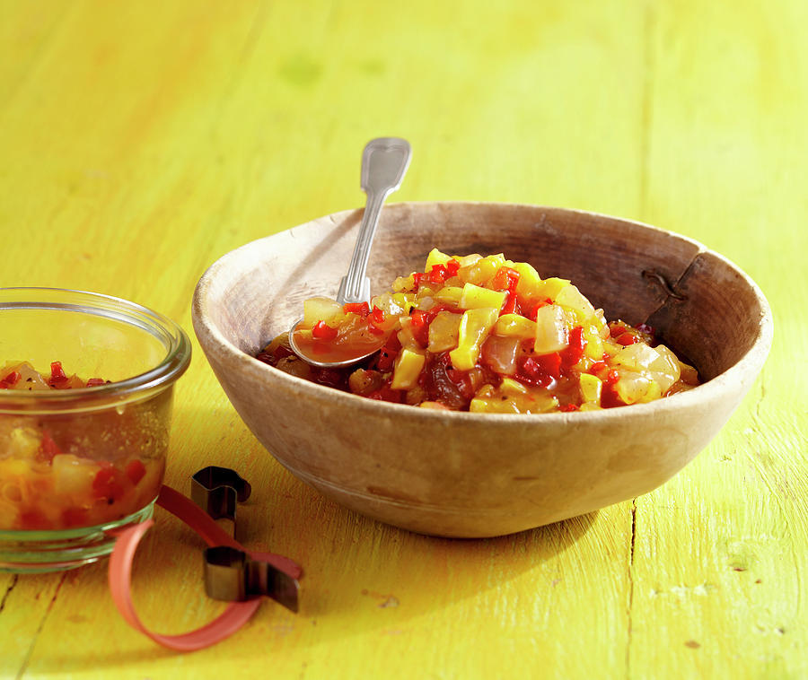 Melon Chutney With Star Fruit, Pepper, Allspice And Vinegar In A Wooden Bowl Photograph by Teubner Foodfoto