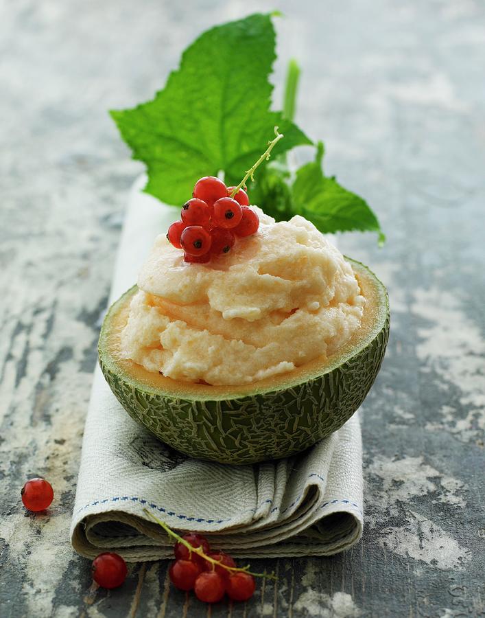 Melon Ice Cream With Redcurrants Photograph by Mikkel Adsbl