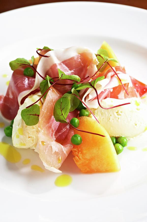 Melon With Smoked Ham And Peas Photograph by Tim Green