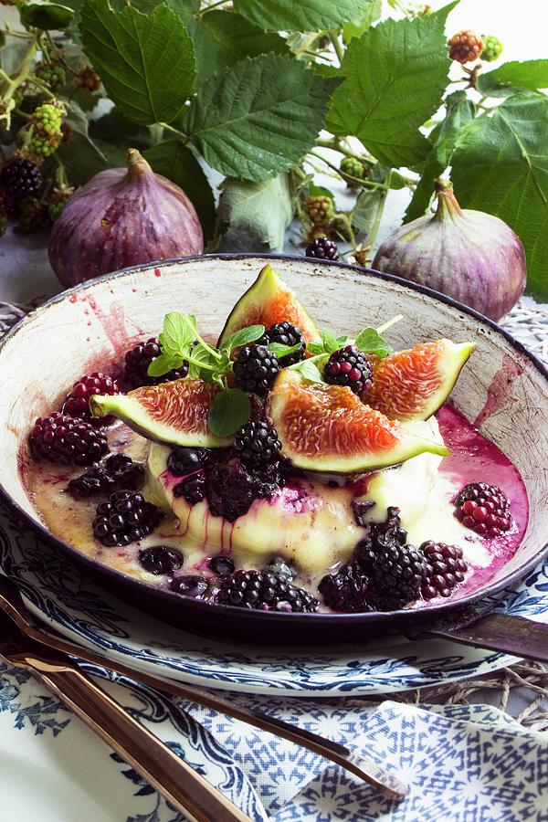 Melted Cheese With Berries And Figs In A Pan Photograph by Charlotte Von Elm