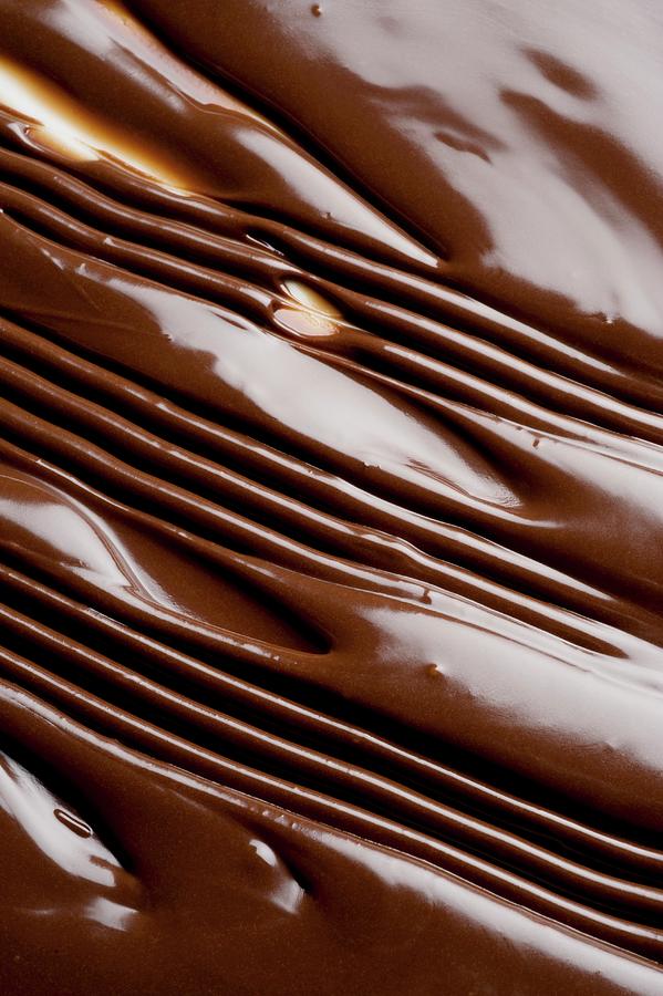 Melted Dark Chocolate full Frame Photograph by Gaelle Ap