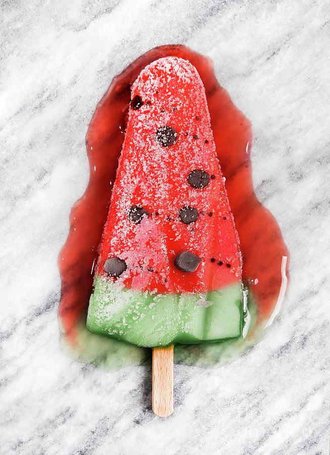 Melting Watermelon Popsicle On Marble Photograph by Westend61