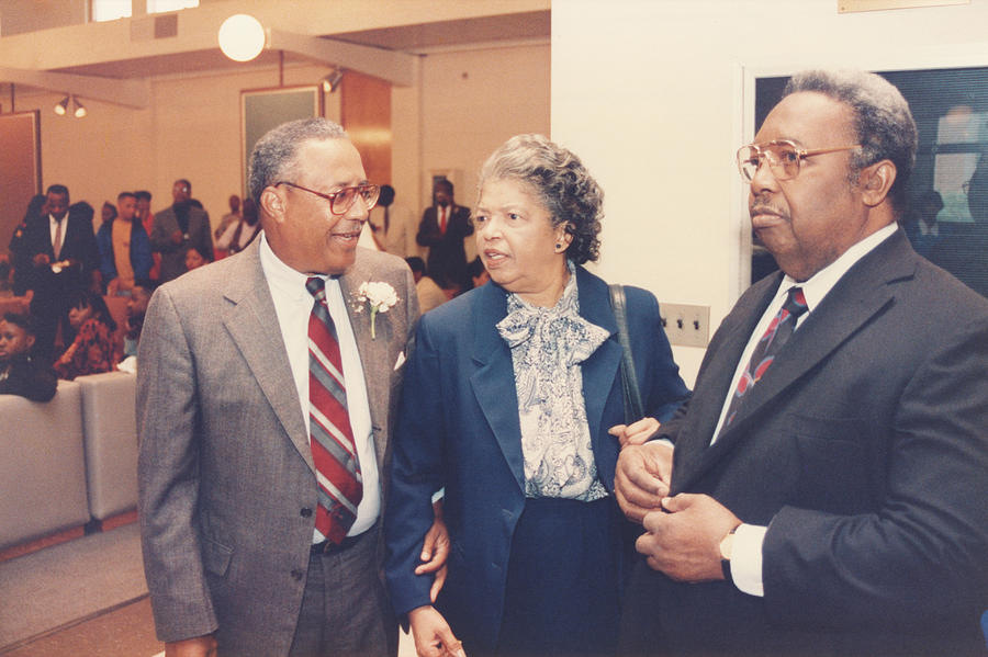 Durham Photograph - Men And Woman Talking At A Party by North Carolina Central University