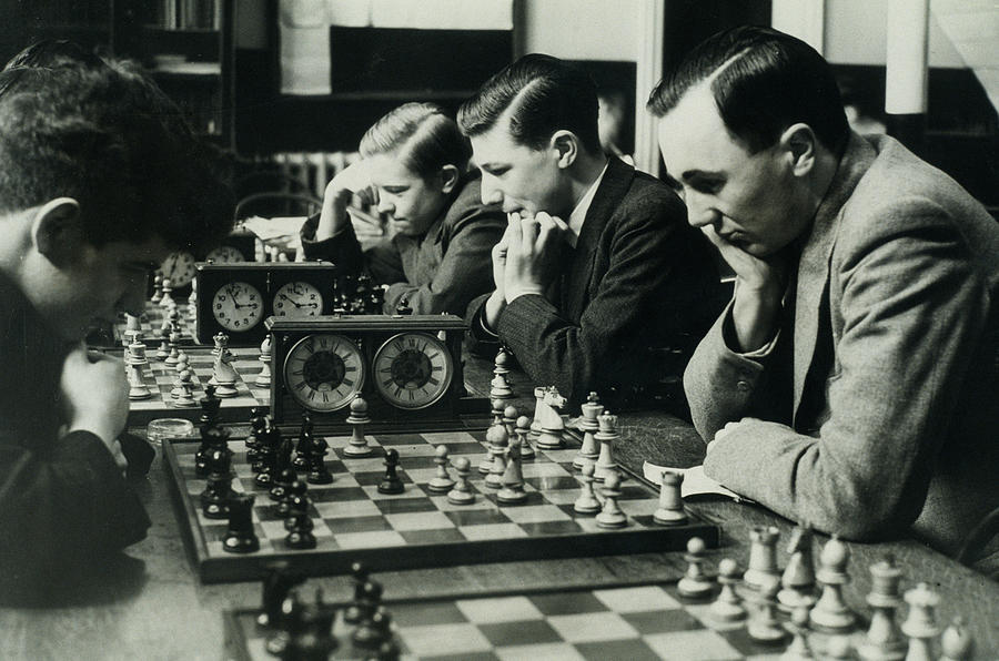 Men Concentrate On Chess Matches, 1940s Photograph by Archive Holdings Inc. Men Concentrate On Chess Matches, 1940s Photograph by Archive Holdings Inc.