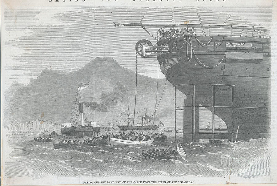Men Extending Cable Line From Ship Photograph by Bettmann